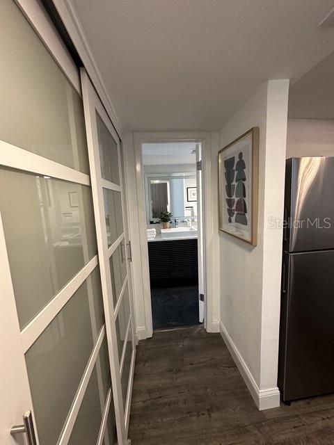 Hallway from living room to kitchen to bathroom
