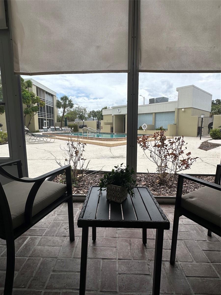Patio with pool view