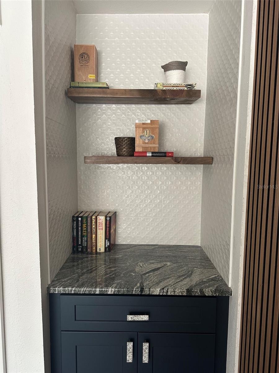 Dry bar with floating shelves