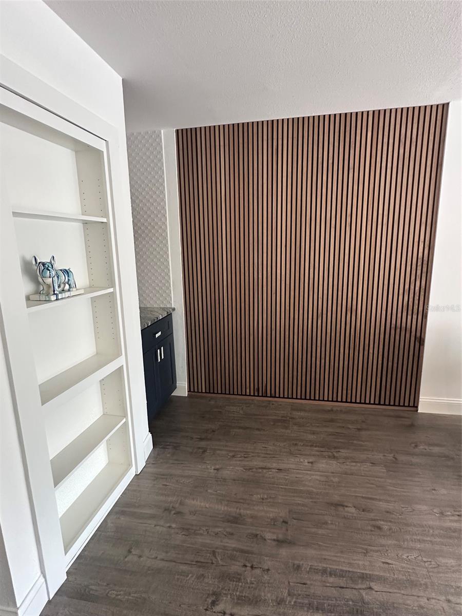 Dining room with wood accent wall