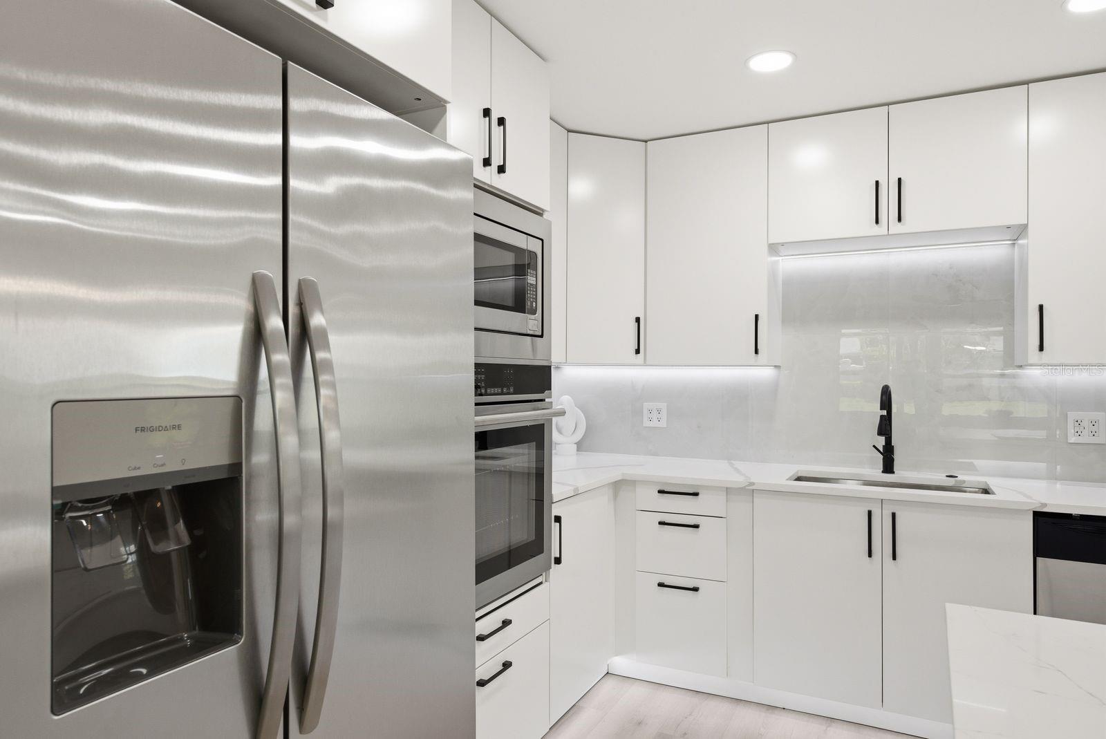 Stainless steel appliances, built in oven and microwave.