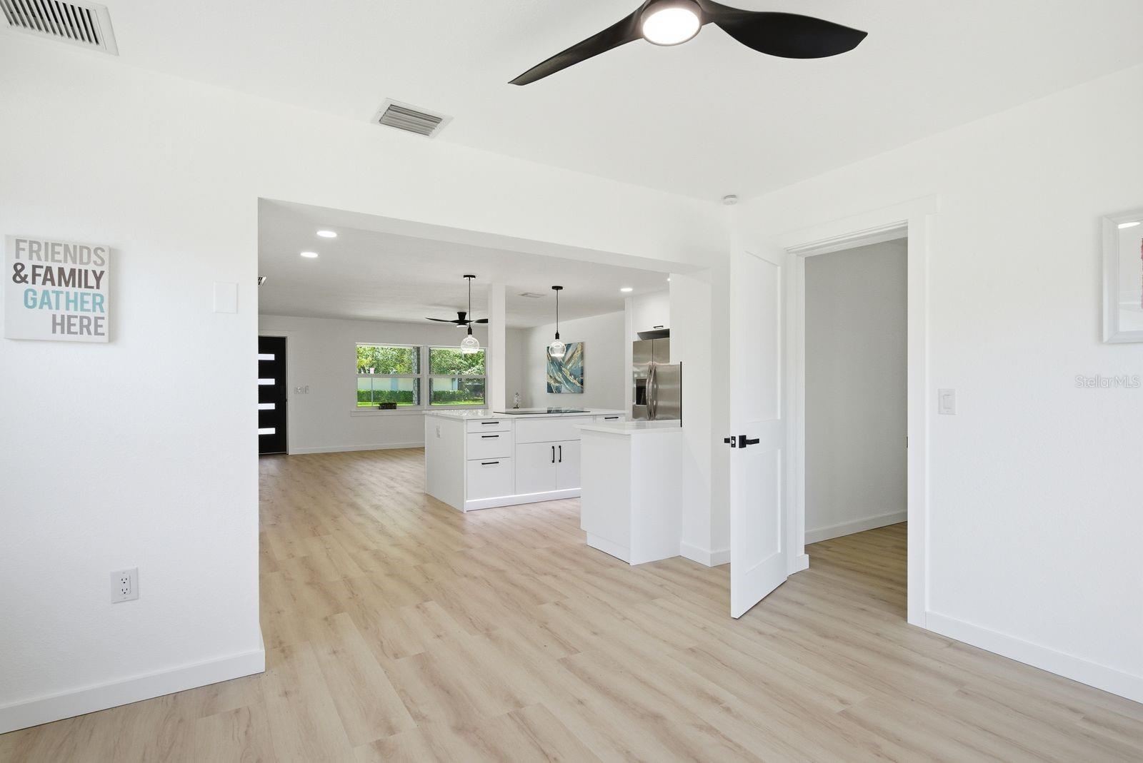 View from dining area to the kitchen/living room.
