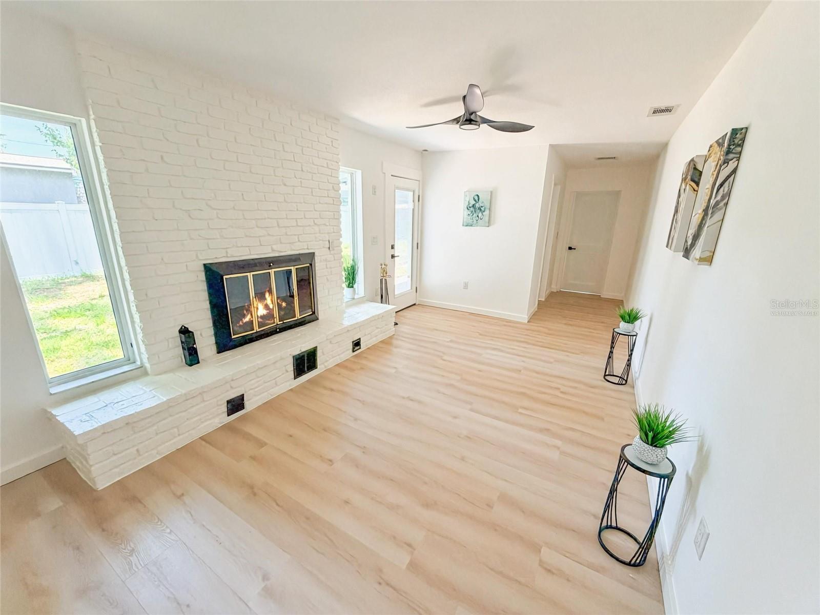*Fire is virtually staged* - This versatile space could also make a great family room, as it features a cozy fireplace — making it the perfect flex space that can be anything you want it to be.