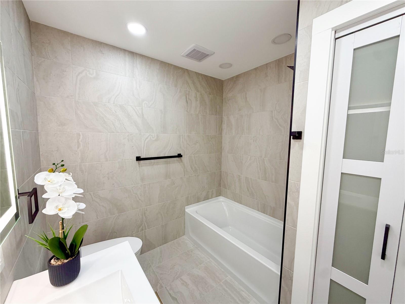 Bathroom #2 features a linen closet as well.