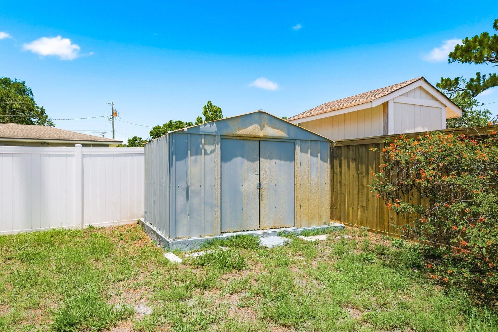 The home comes with a shed for extra storage.