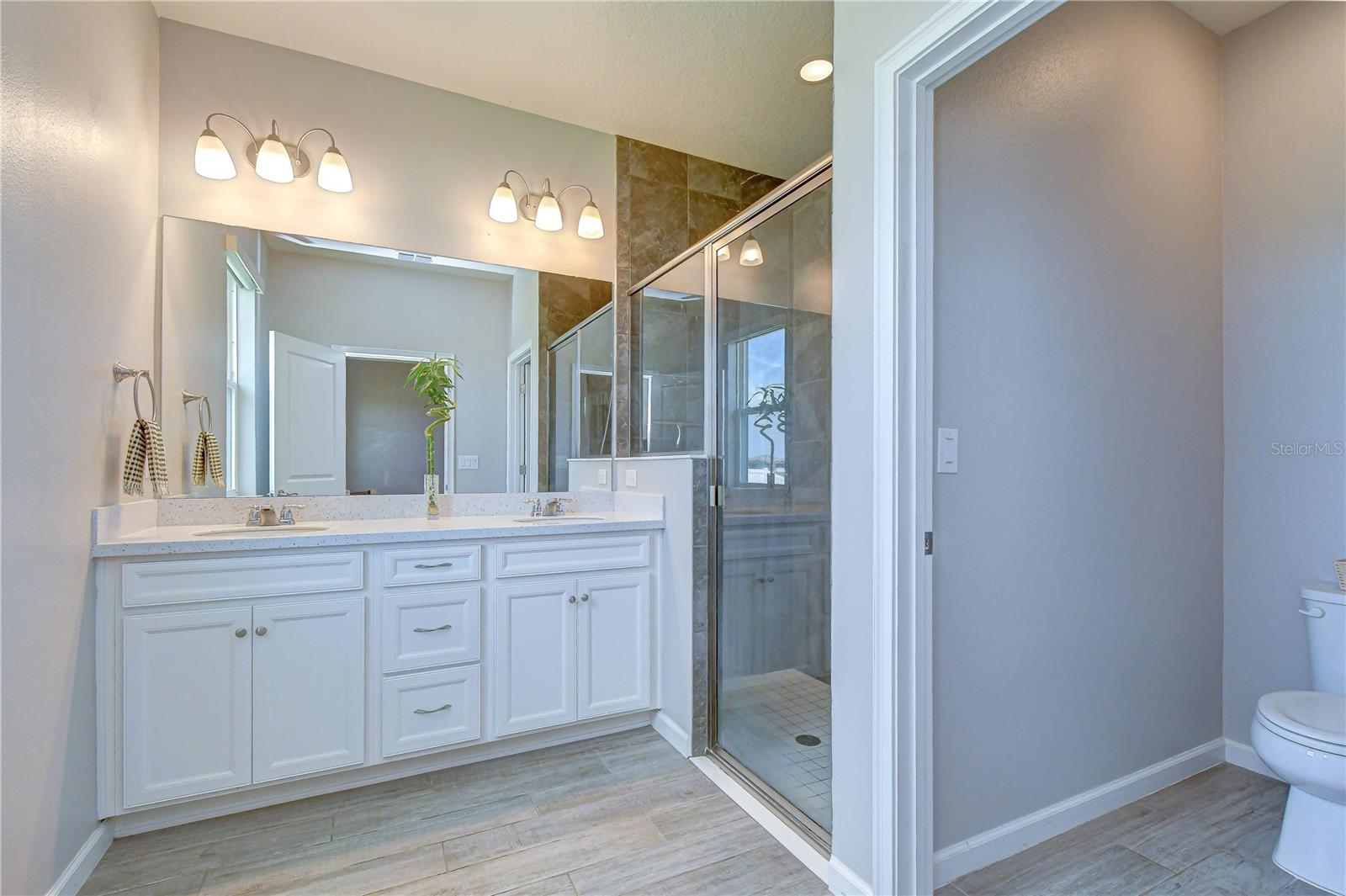 Well-appointed en-suite bath with modern upgrades.