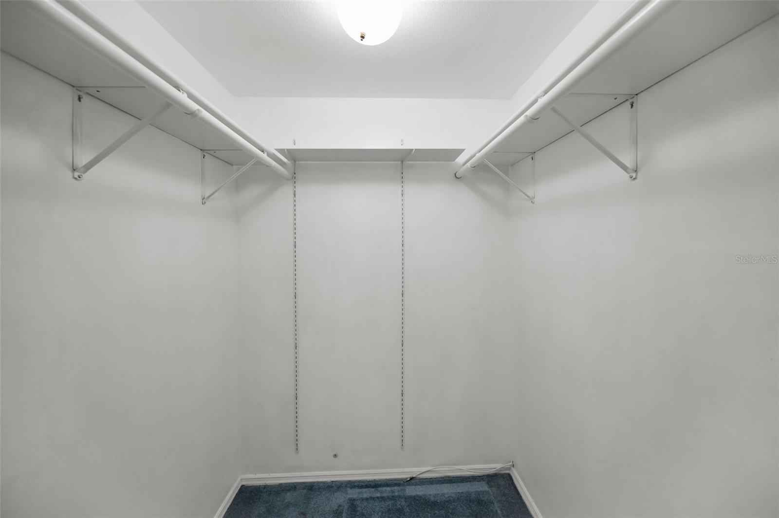 Large walk in primary closet.