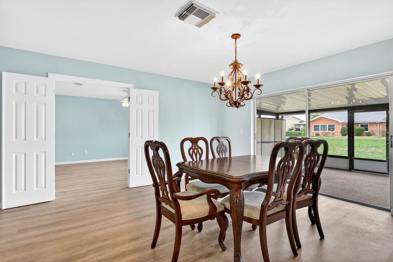 Dining area showing Master Bedroom with french doors
