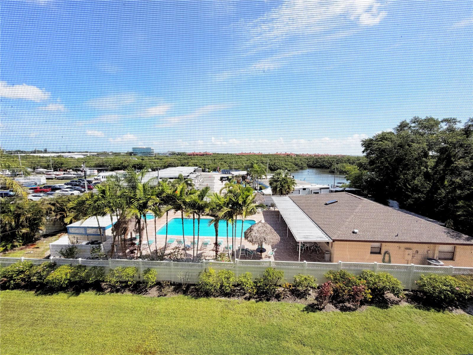 View from Balcony to the pool, marina, and Bay