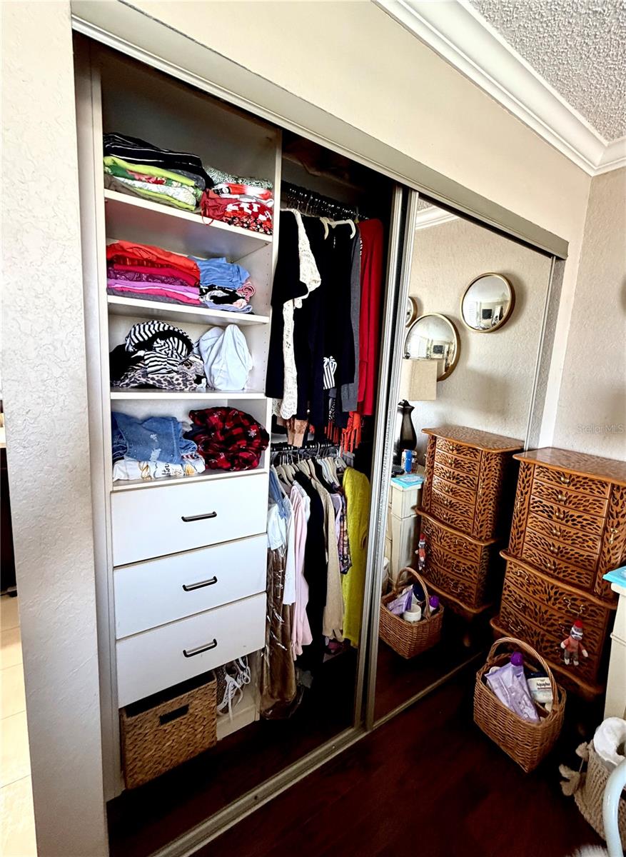 1 of 2 Master Bedroom closets with Built In Organizers and Storage