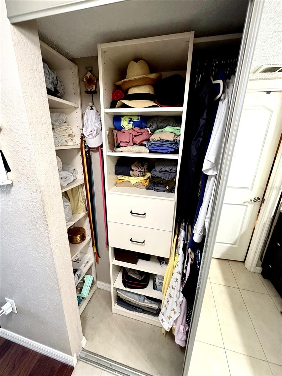 2 of 2 Master Bedroom closets with Built In Organizers and Storage
