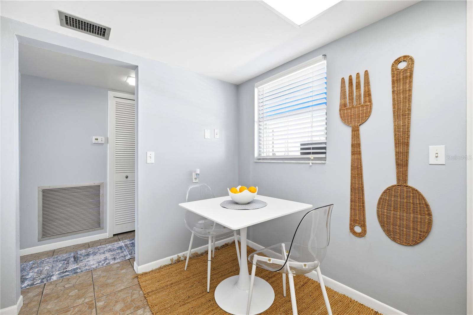 window in kitchen brings in lots of sunlight