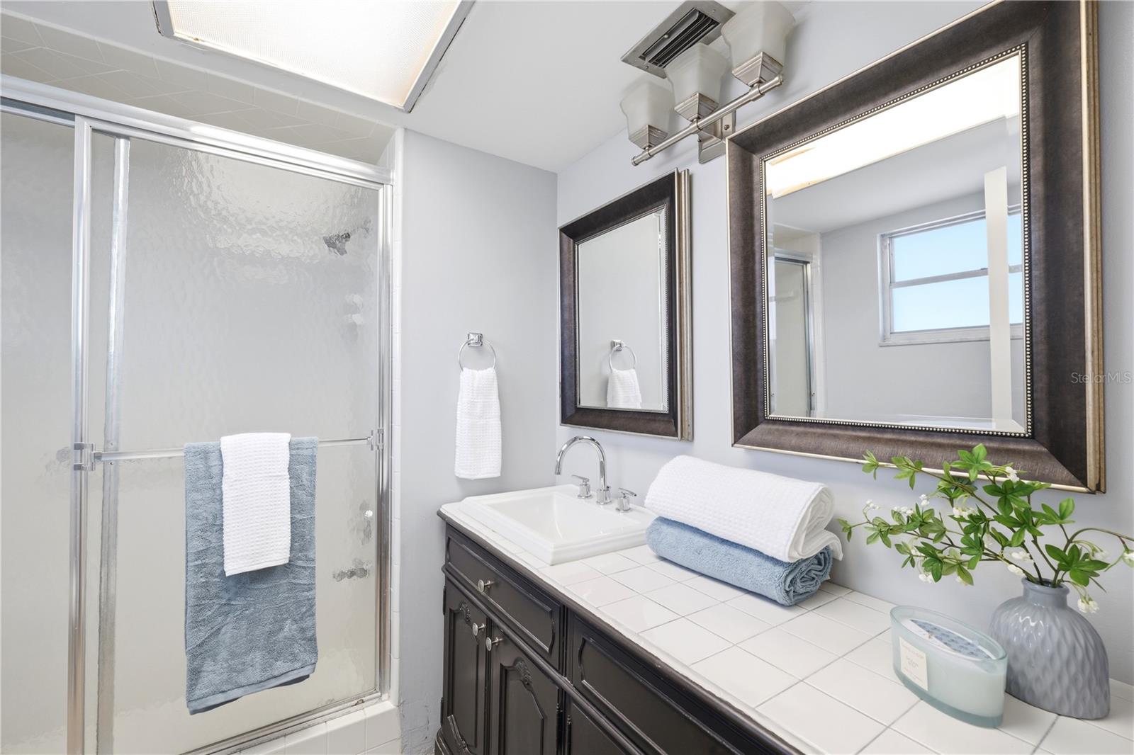 spa like master ensuite bathroom with large walk in shower