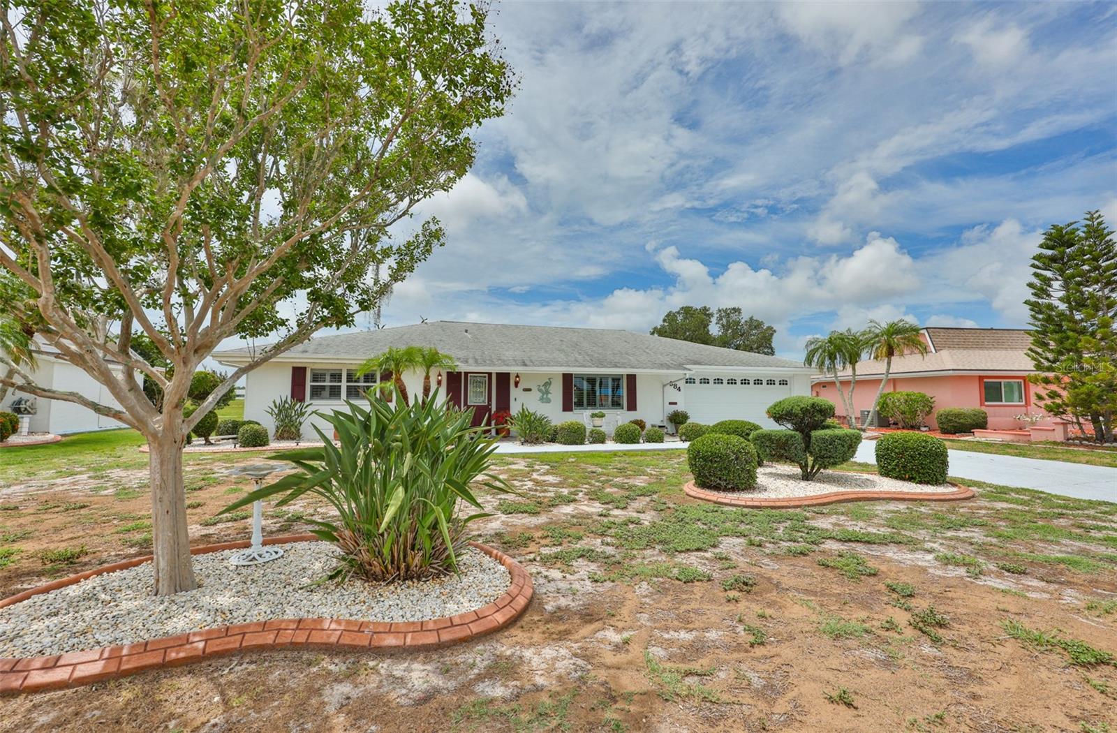 Front, Painted Drive & Walk Way, Upgraded Concrete Curbing, Charming Curb Appeal