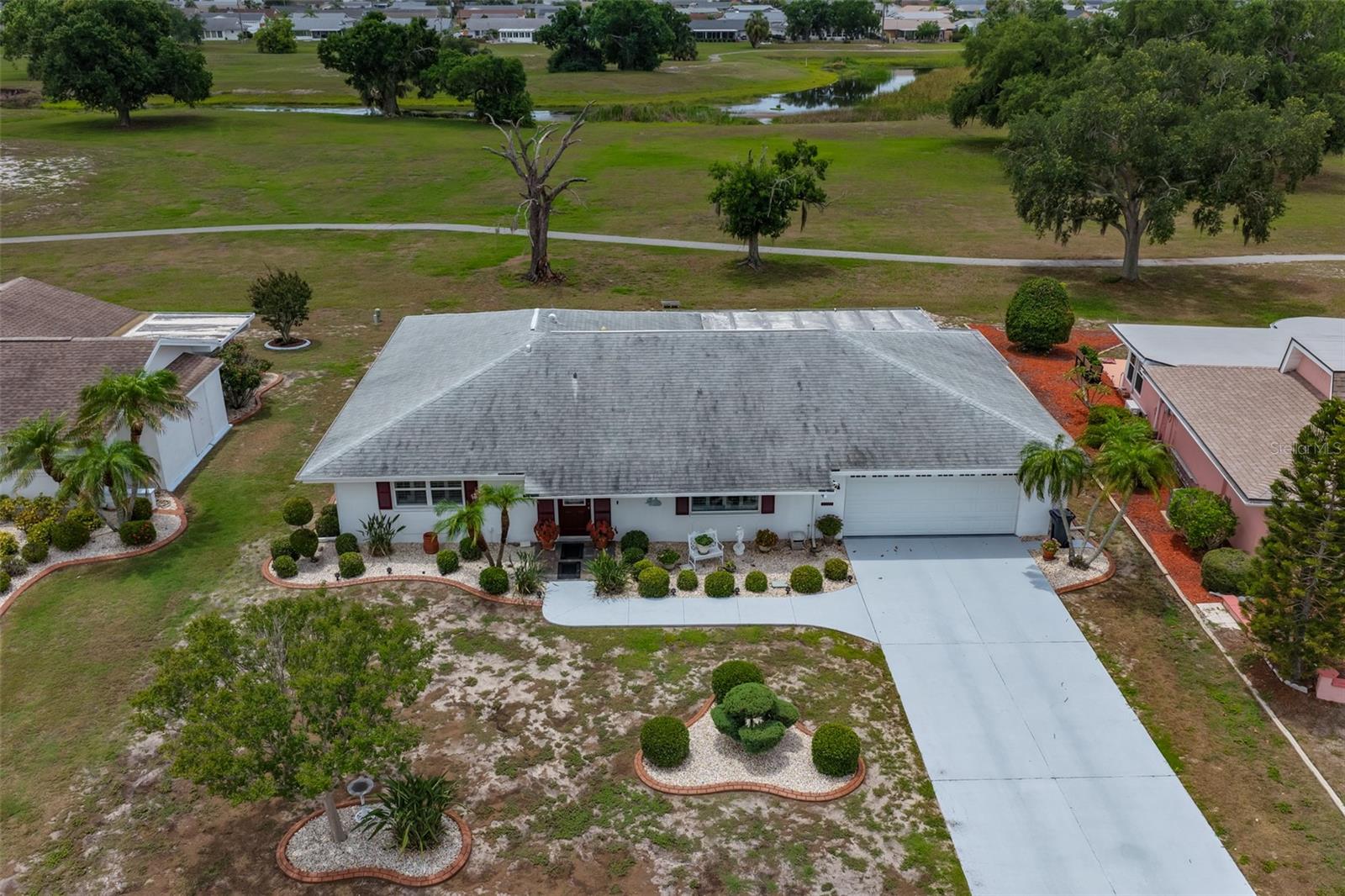 Aerial Front, Painted Drive & Walk Way Open Green Space, Upgraded Curbing