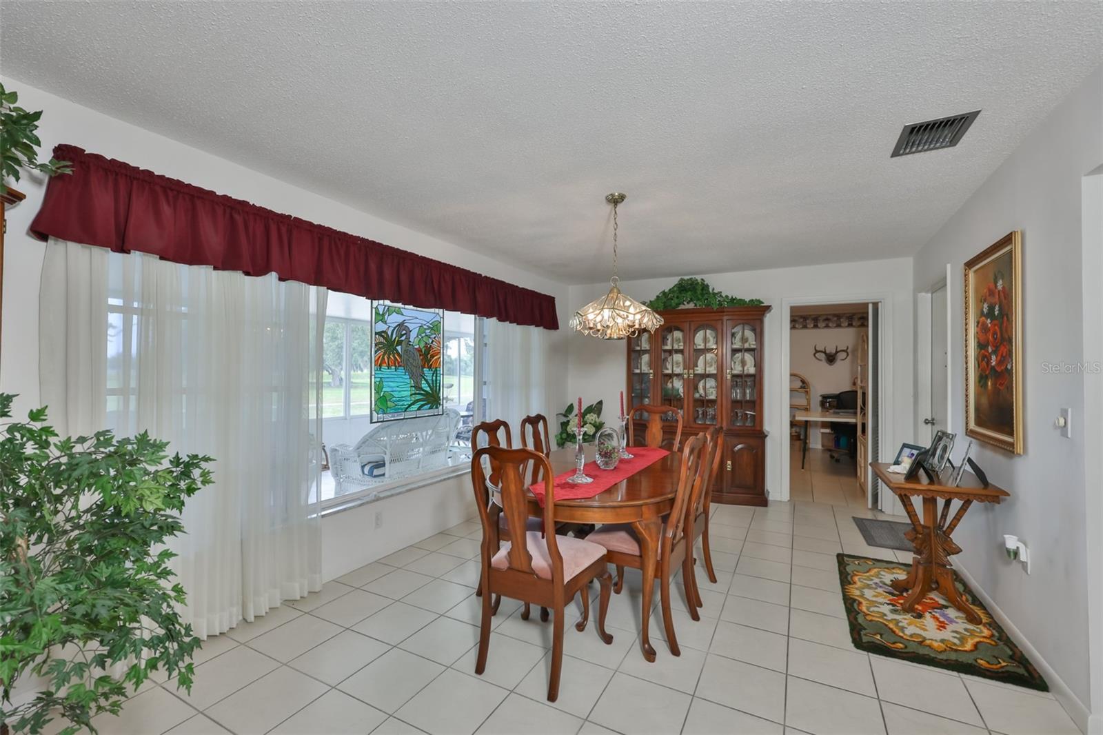 Dining Room w/Picture Window Serene View Of Green Space, Bonus Room