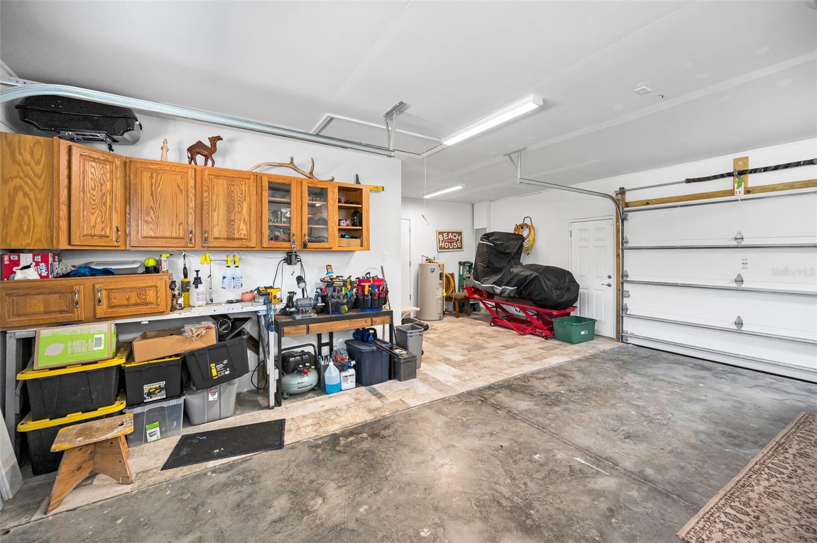 Oversize 2 Car Garage w/ work bench, motorcycle pad, etc...