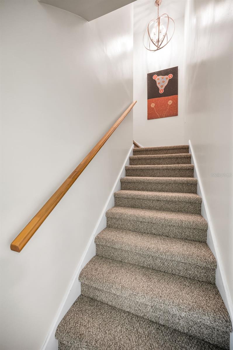 Stairway to the Primary Bedroom with a Balcony over looking the outstanding view