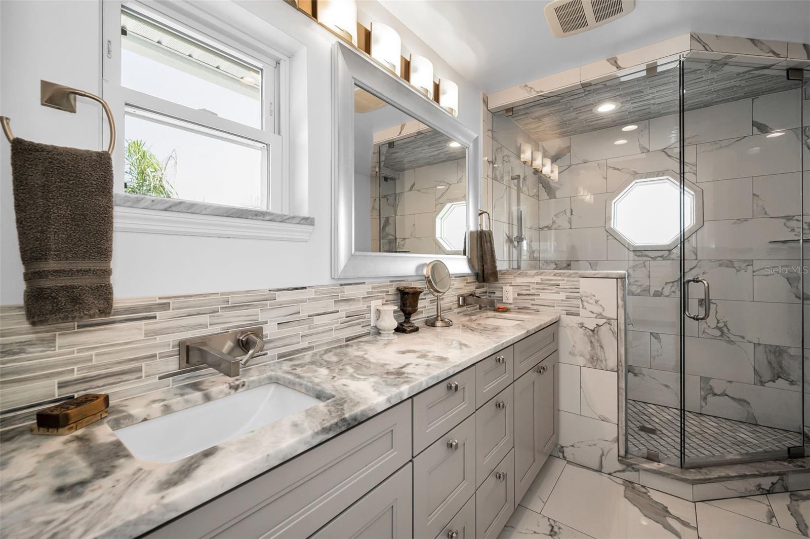 Duel. sinks, walk-in shower
