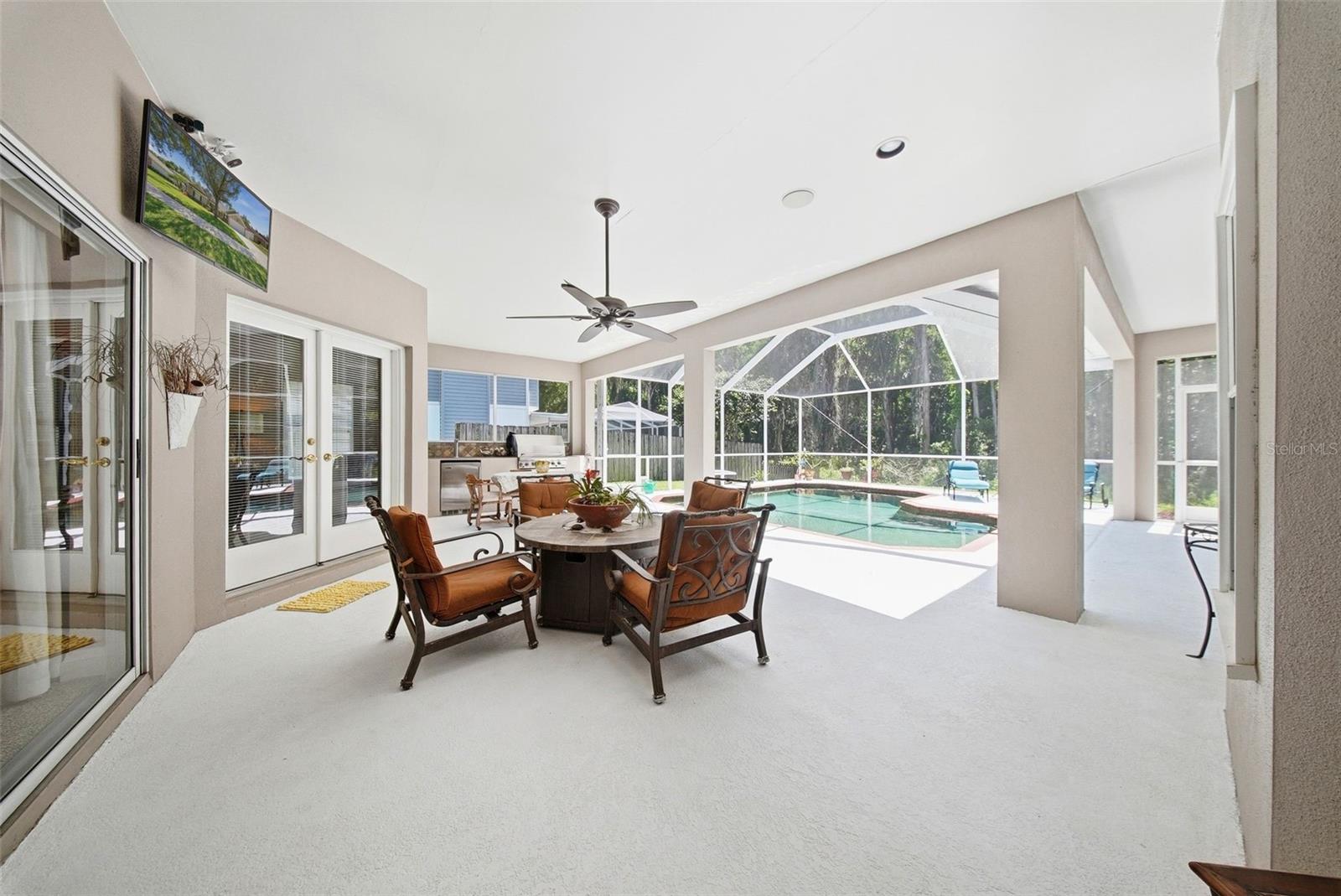 Large entertainment area with salt water pool, outdoor grill and a kegerator!