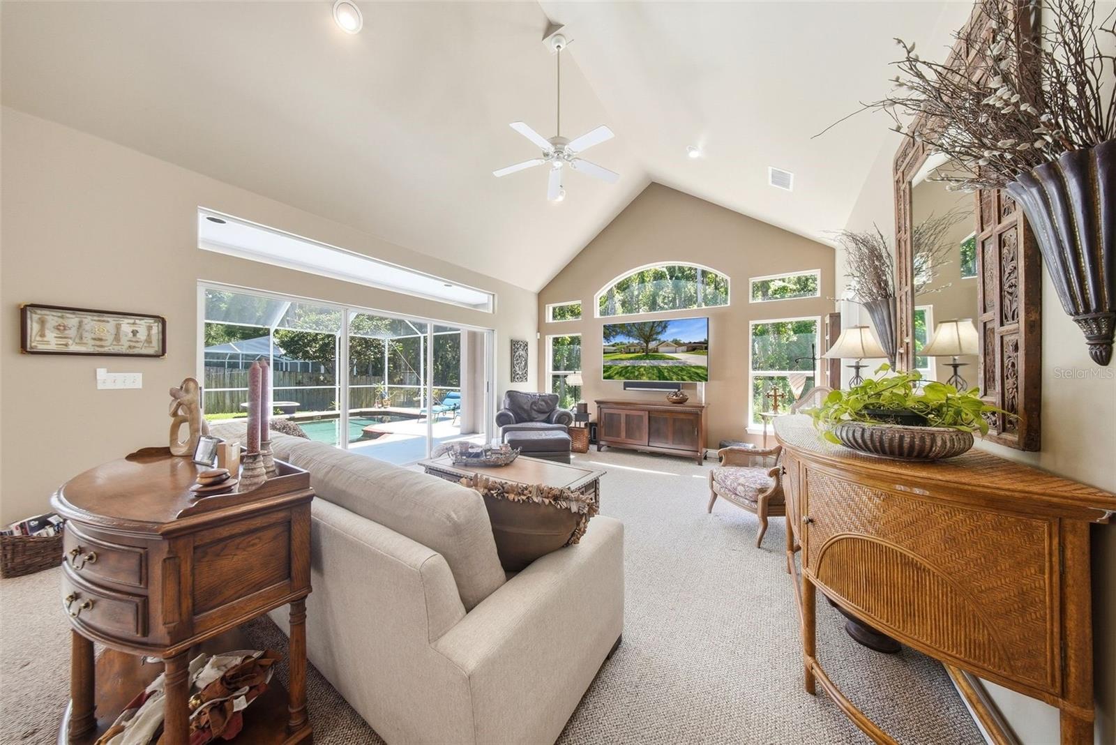 2nd family room/living room with access to the pool area.