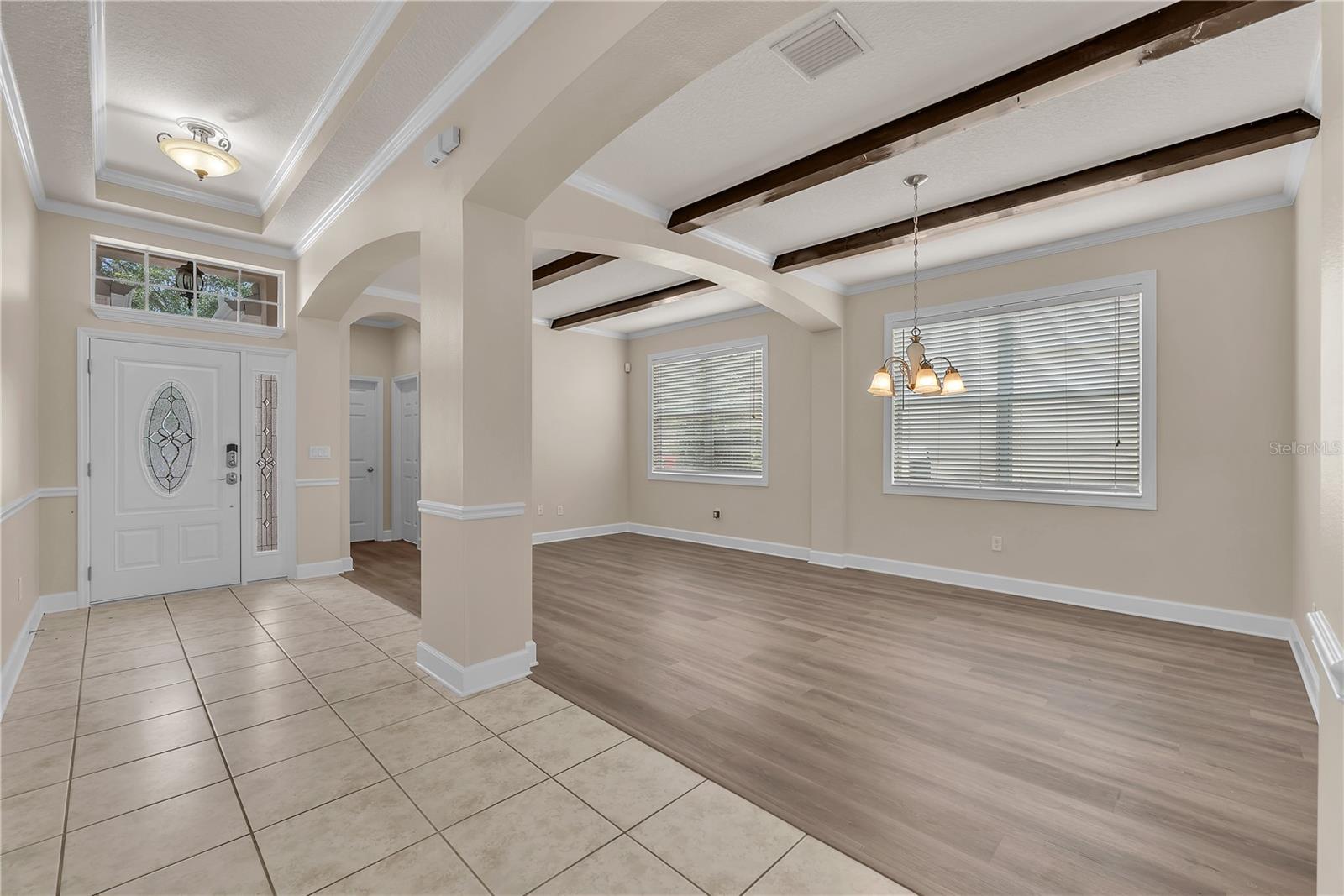 A privately located fourth bedroom and full bath next to the front entry would make the perfect private in-law suite or guest retreat.