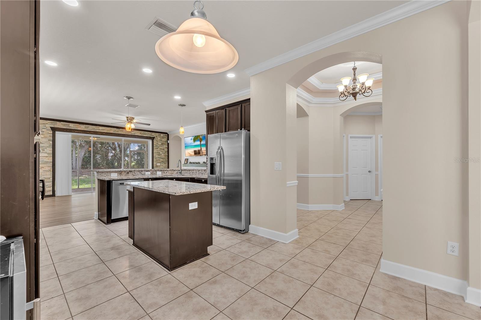 Designed for gathering, the kitchen opens to the family room, keeping everyone connected.