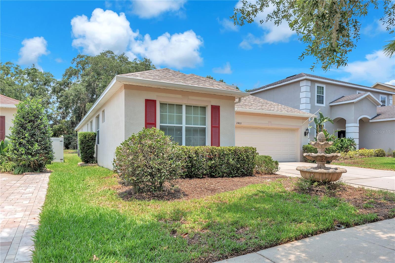 Recent updates include a roof replacement in 2026, updated luxury vinyl plank flooring throughout living areas and quality carpet in the bedrooms in 2026, an upgraded A/C handler in 2020, and a gas water heater replacement in 2018. Additional features include a water softener and pre-wiring for a security system.