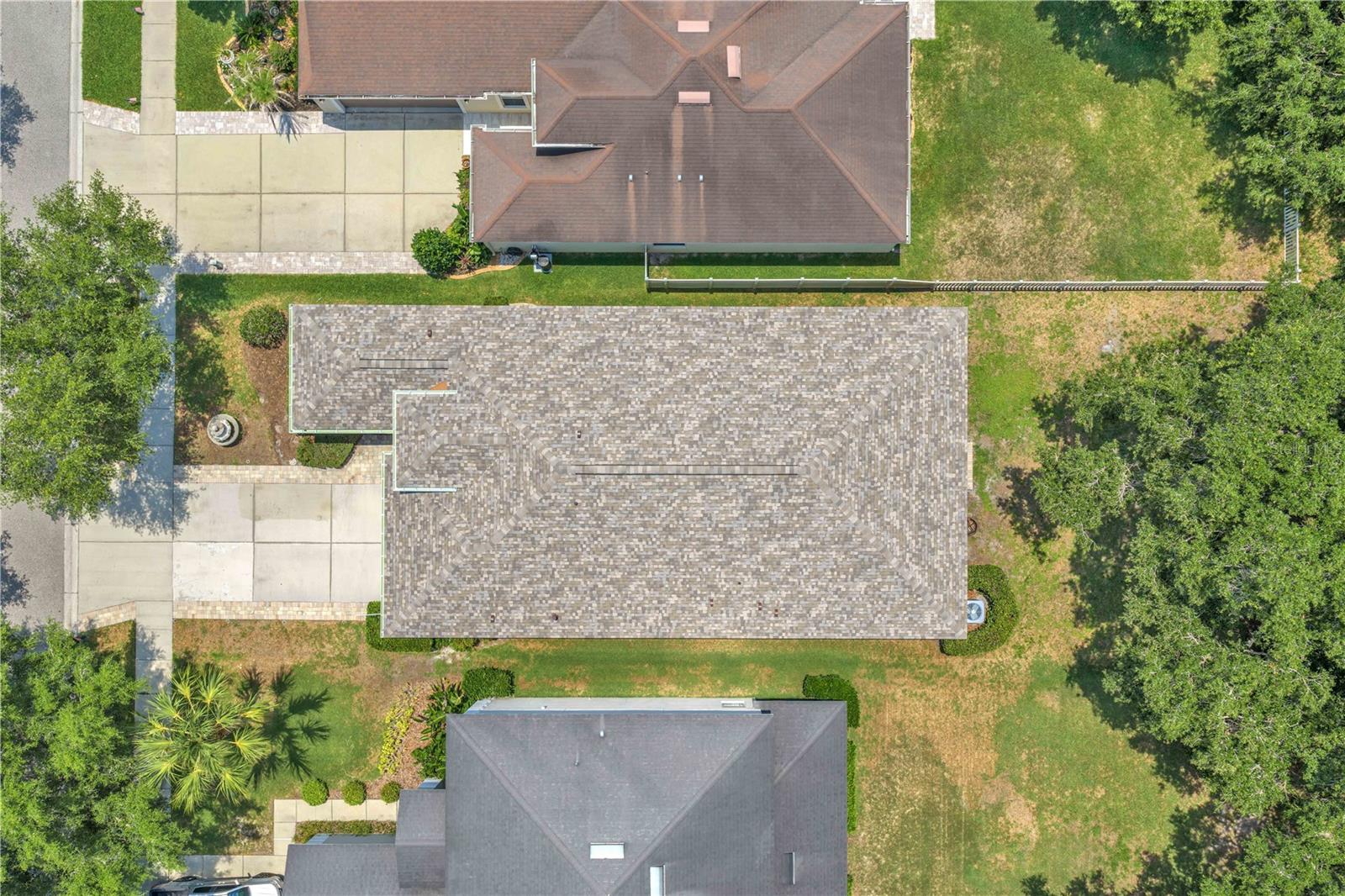 Aerial view of lot with new roof replaced in 2026.