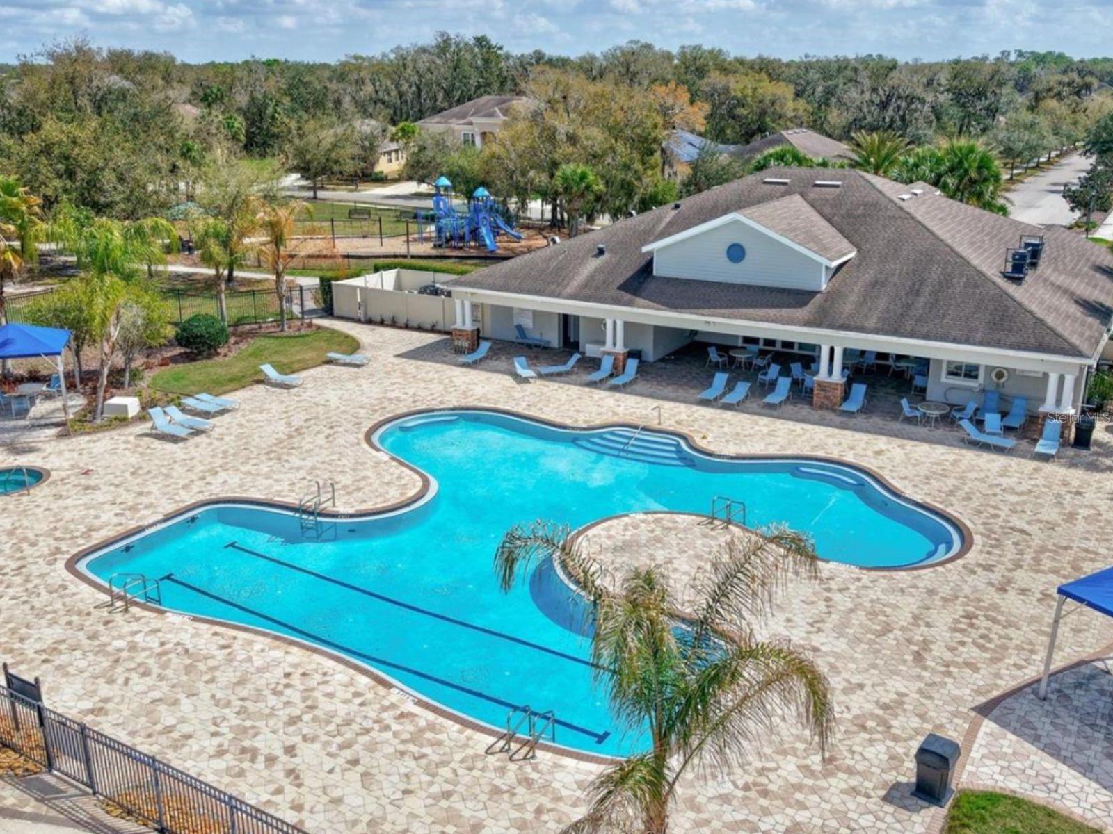 The community pool offers residence a refreshing retreat on warm Florida days, with dedicated swim lanes for those looking to stay active.