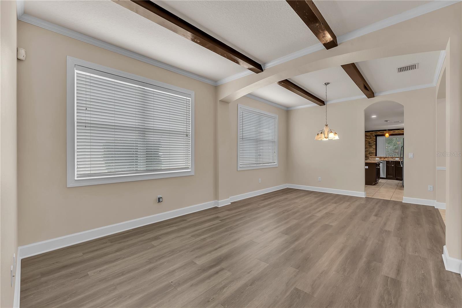 Designed with entertaining in mind, this home features both formal living and dining spaces with access to the kitchen.