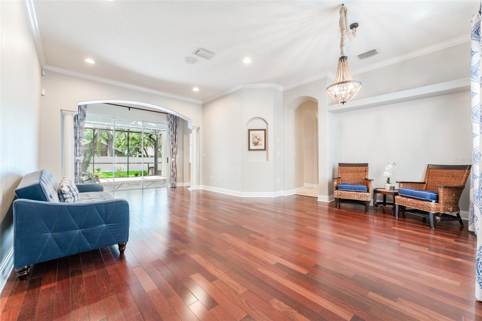 Formal Space with Wood Flooring and Loads of Natural Light