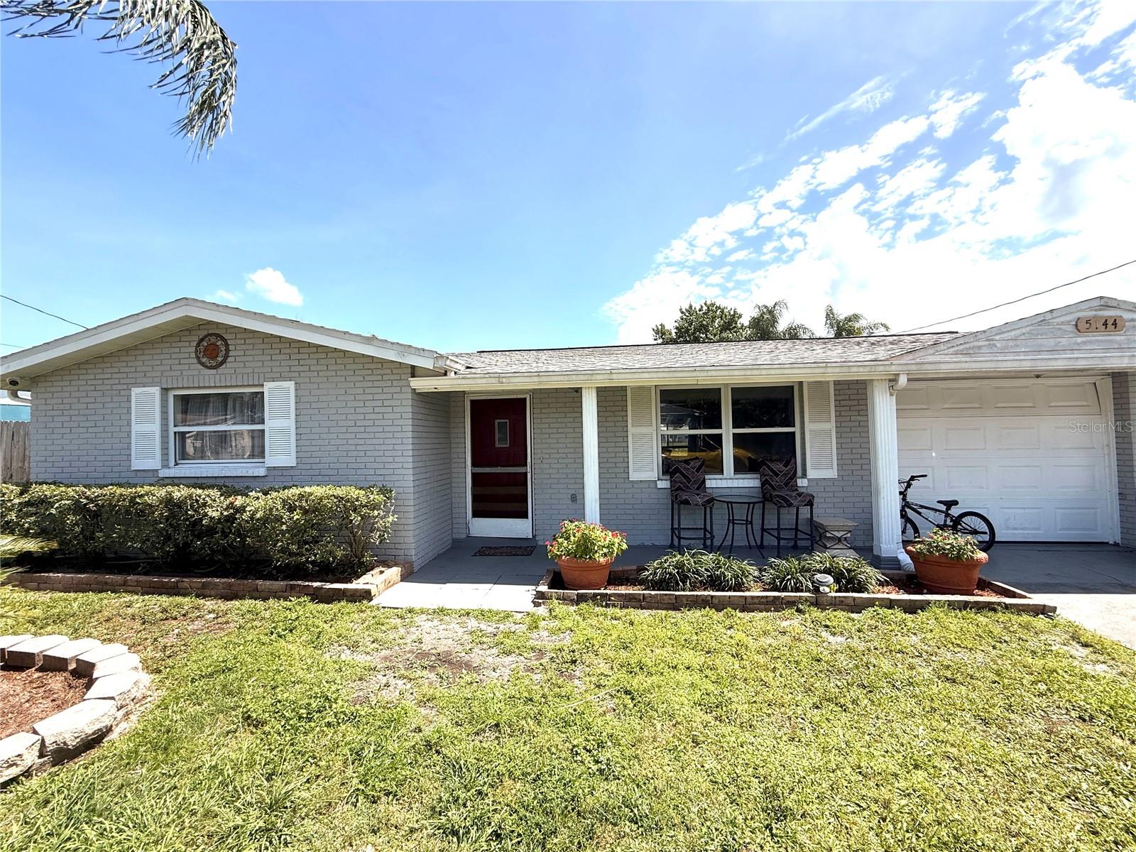 2 bedroom 1.5 bath:  Flex room used as a 3rd Primary bedroom that looks out over the lake.