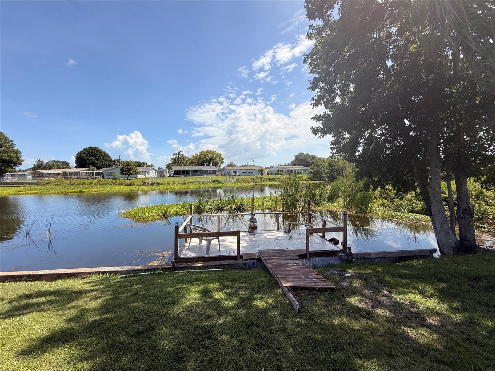 Lake Diane.  Stationary dock. Fenced in yard