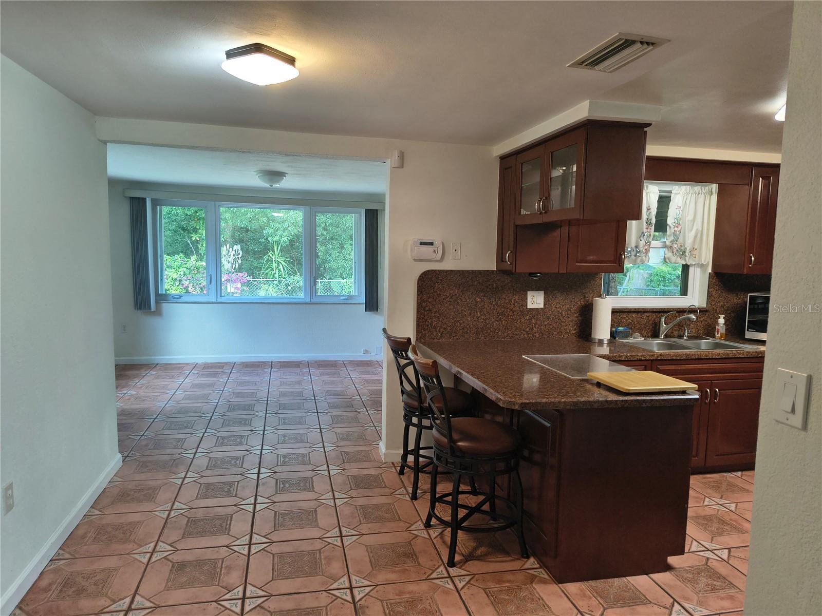 Looking past Breakfast Bar into Family Room