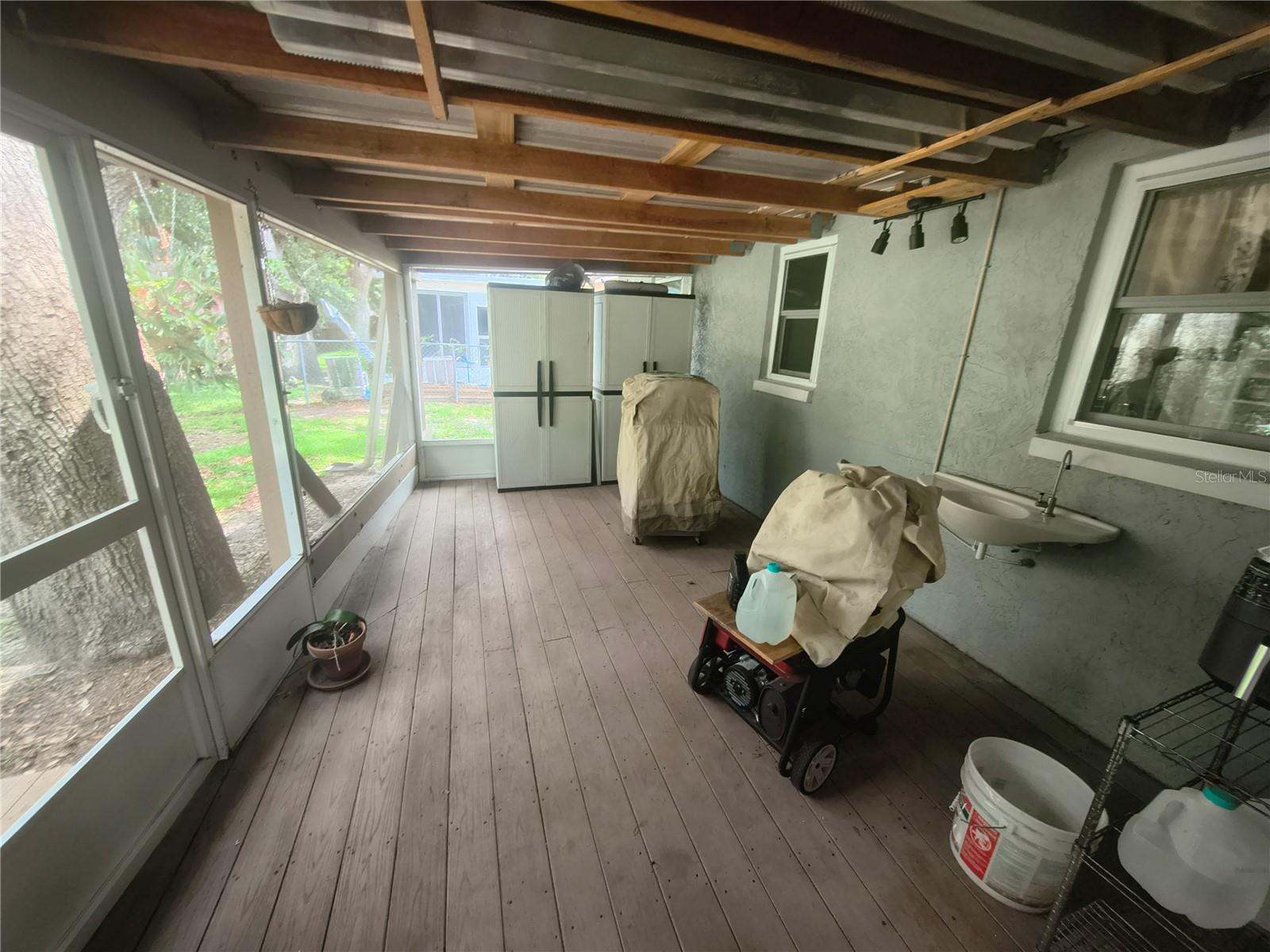 Spacious Lanai has a metal roof