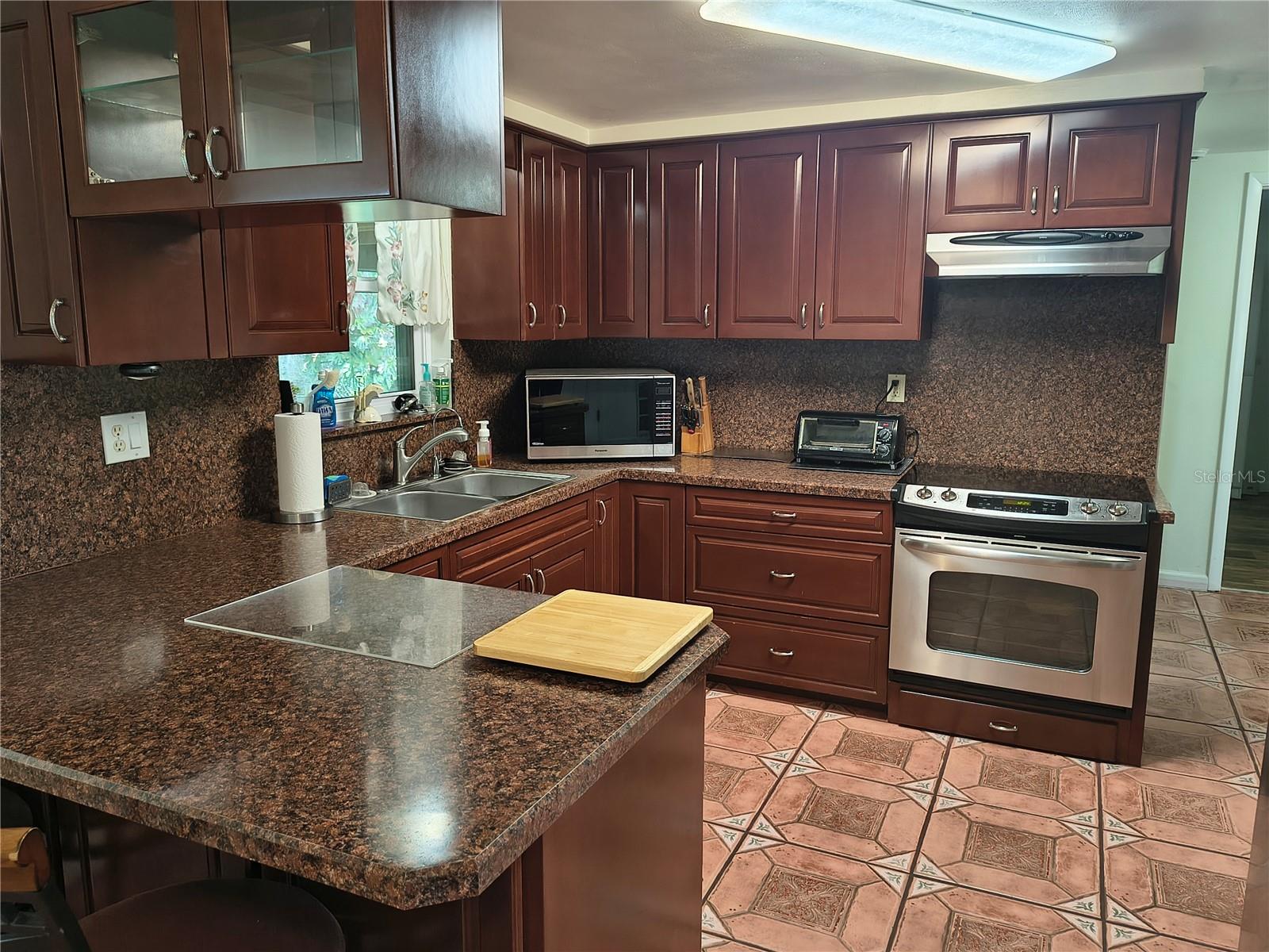 Custom Designed Wood Cabinetry in Kitchen- 2014