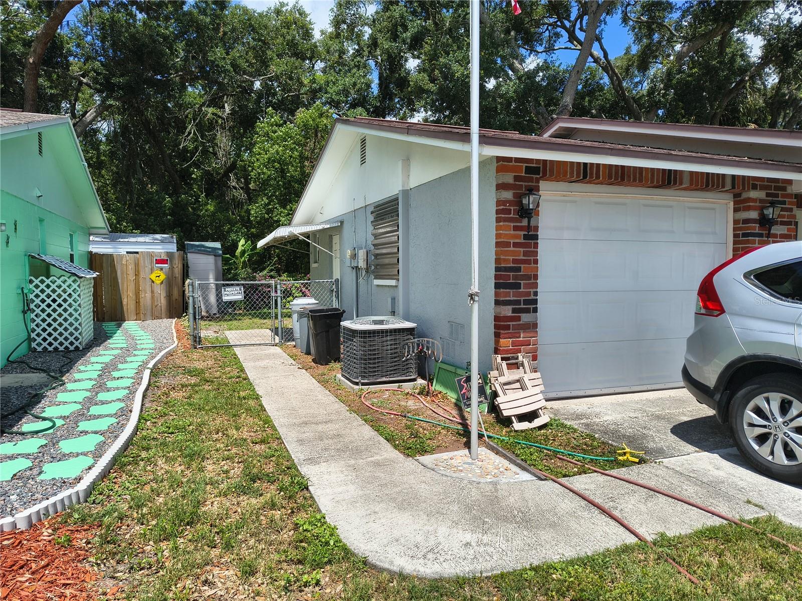 Sidewalk goes around the whole side yard with Fenced Yard