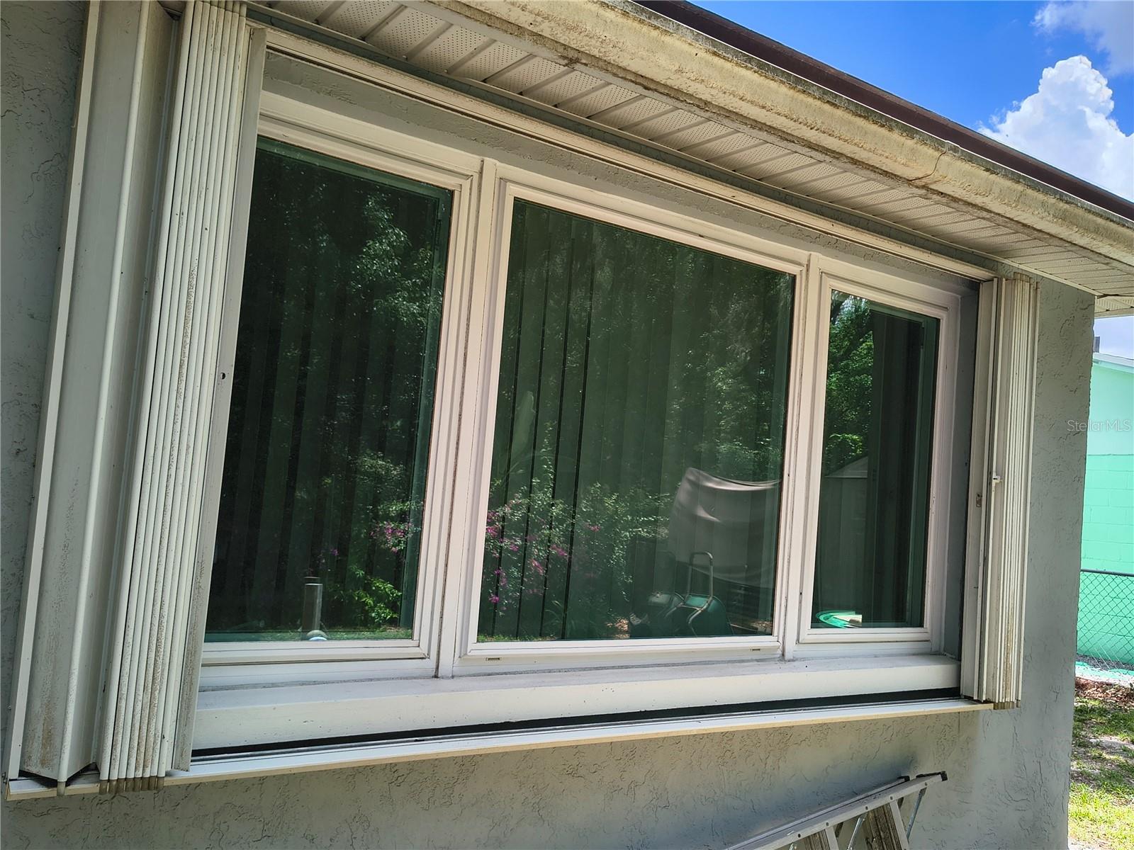 Bi-fold Hurricane Window Shutters