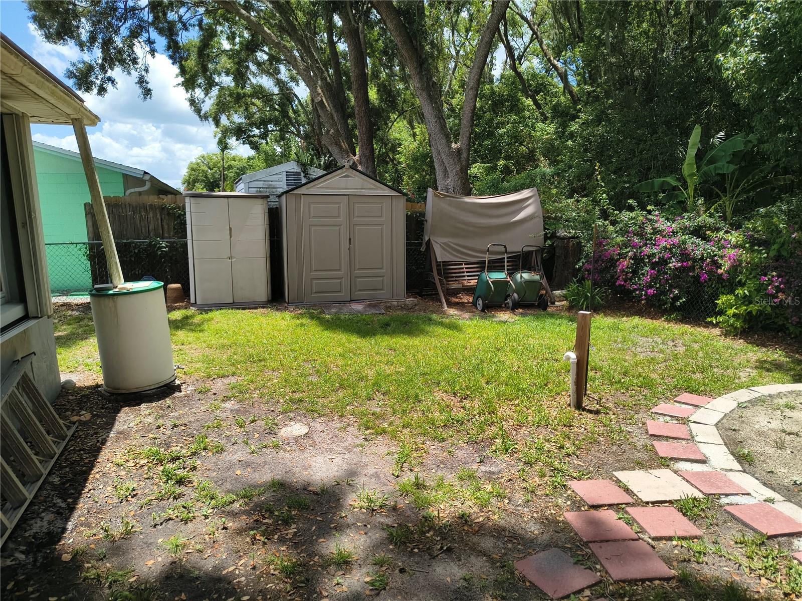 Rain Barrels collect rainwater. Sheds for storage