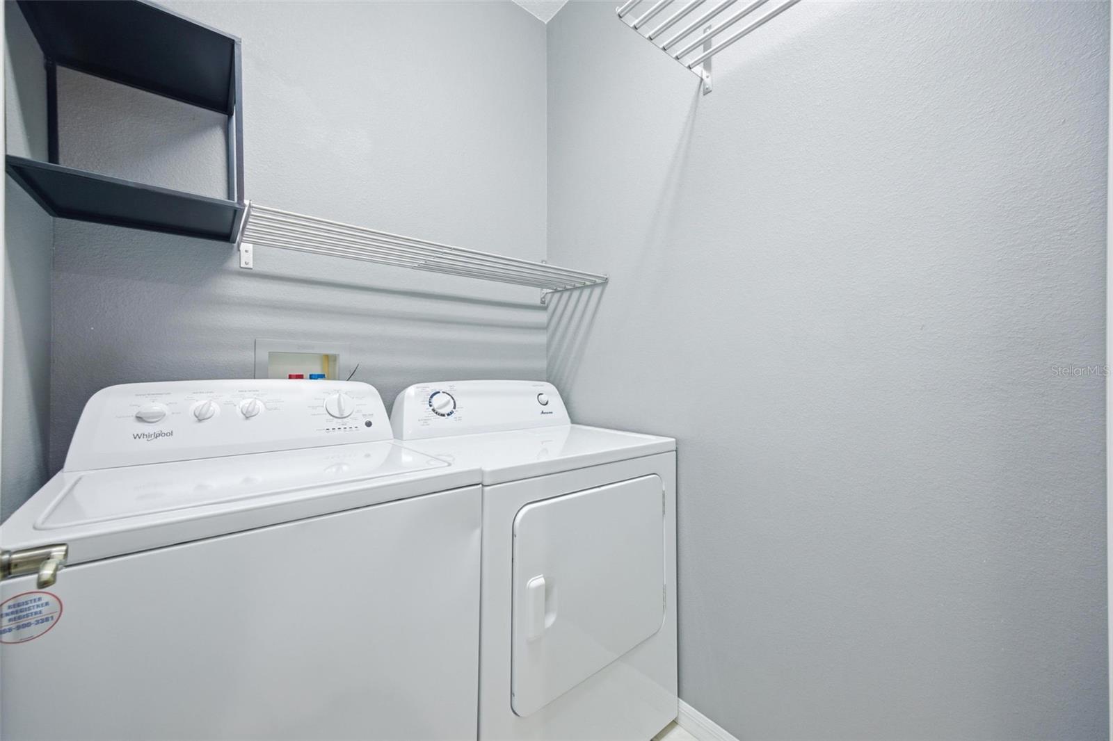 Laundry room conveniently located upstairs