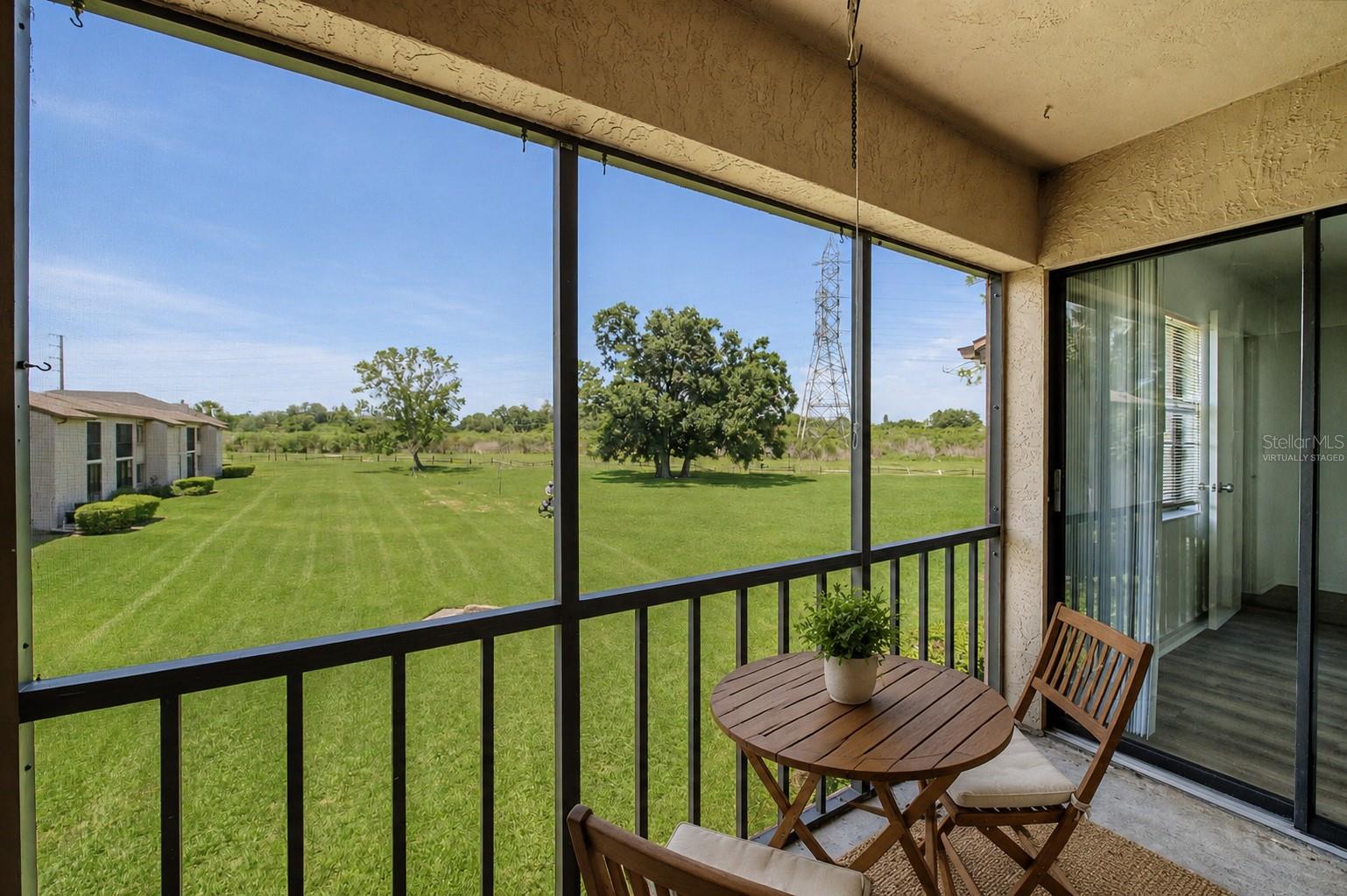 Virtually staged.Screened balcony.