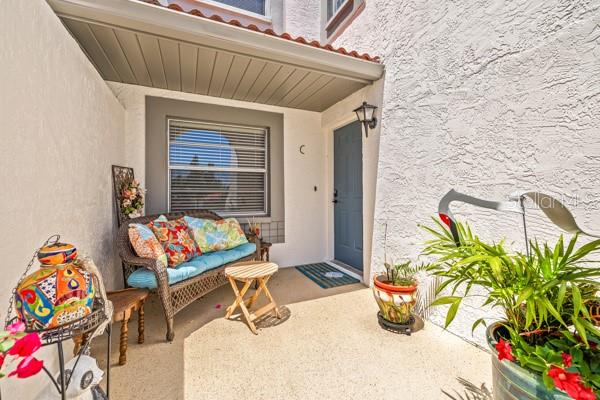 Front patio is large enough for outdoor furniture and plants.
