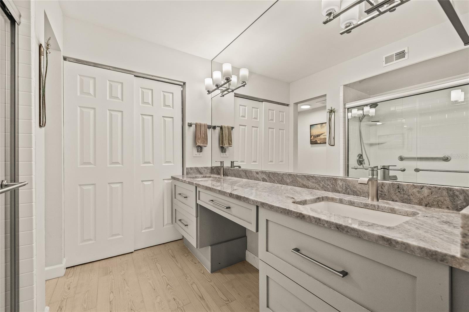 Updated primary vanity with two sinks.