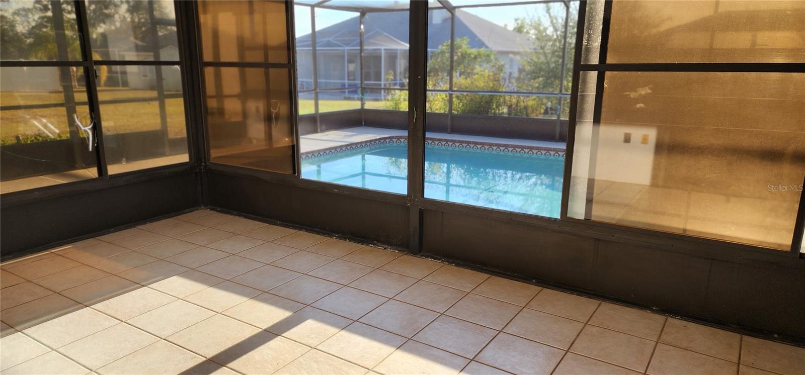 SCREENED/ENCLOSED FLORIDA ROOM