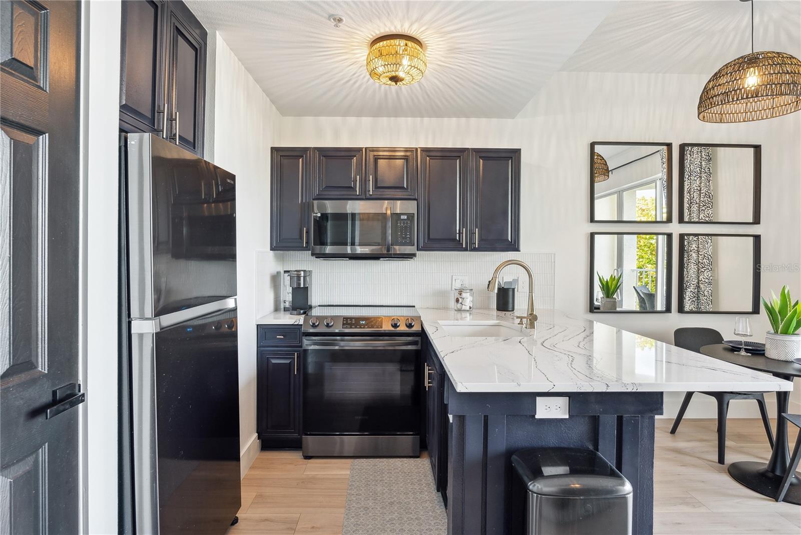 Spacious kitchen with Cambria Quartz "Portrush" series luxury countertops and 2023 new appliances