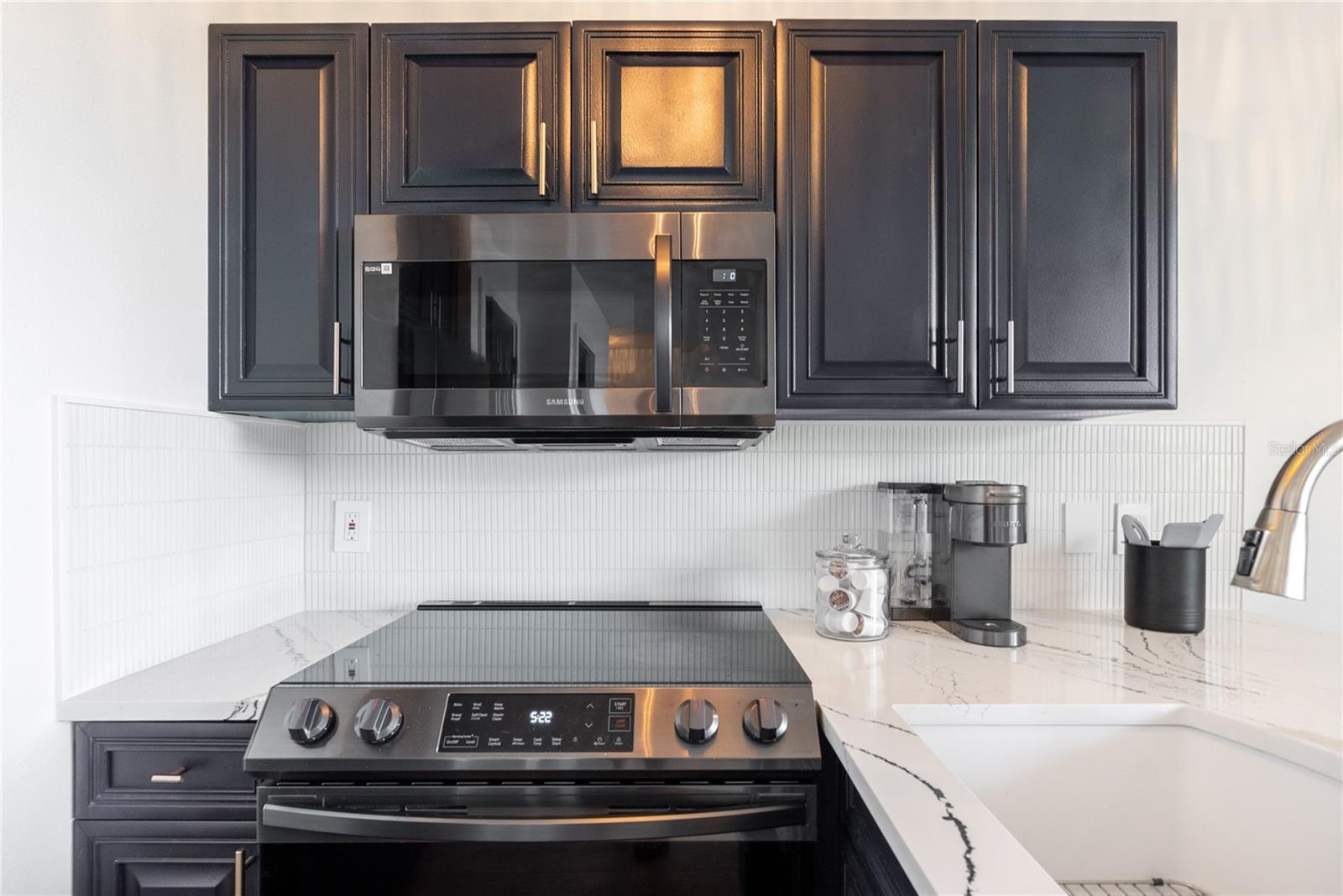 Spacious kitchen with Cambria Quartz "Portrush" series luxury countertops