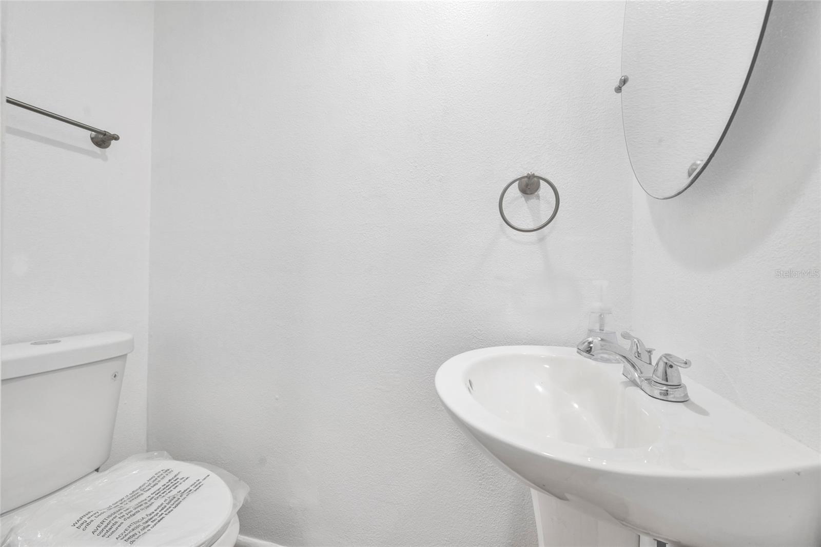 First Floor Half Bath ~ New Energy Efficient Toilet.