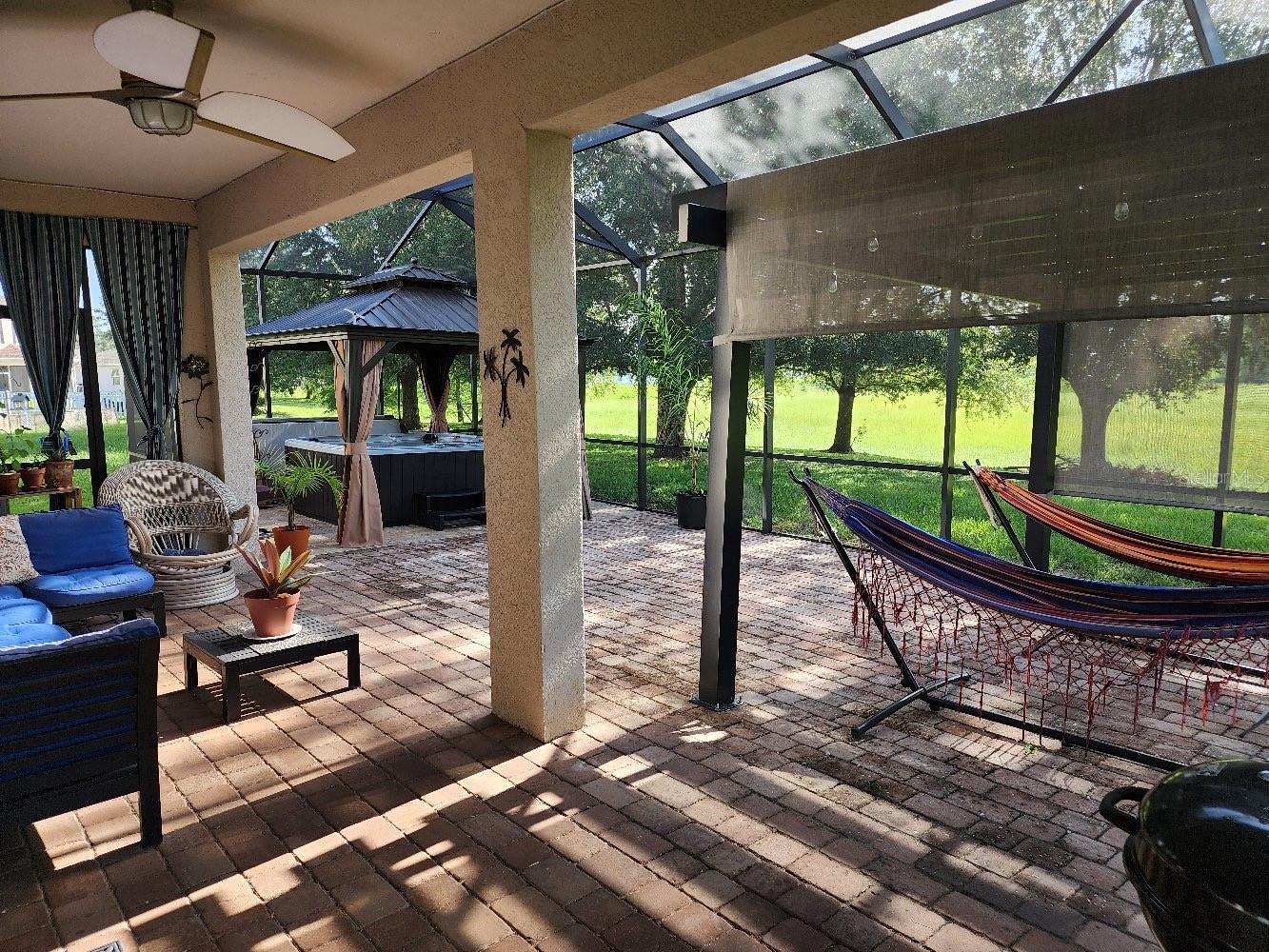 Extended screened back porch with Hot Spa