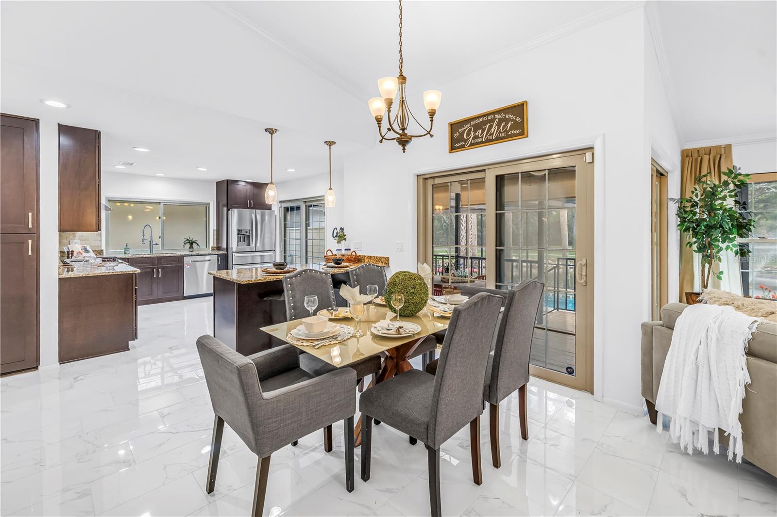 Dine Indoors with views to the pool and lanai